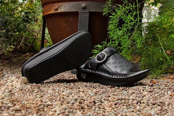 Klover Black Butter Sandal on a rocker outsole with leather upper. KLO-641