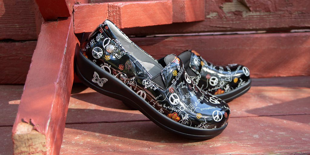 Keli Peace and Love slip on with double elastic gores on a Classic rocker outsole. KEL-7470