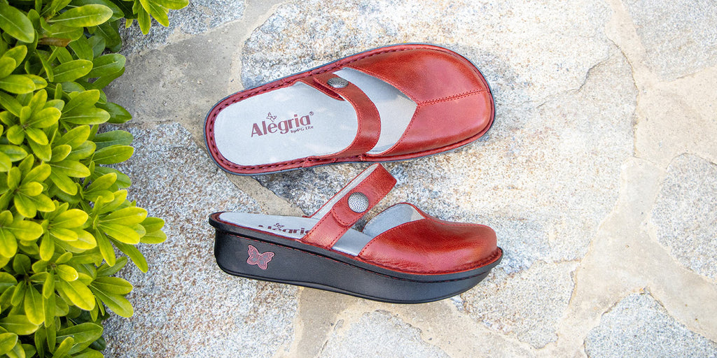Kamila Garnet slip-on shoe on classic rocker outsole with patented footbed design. 