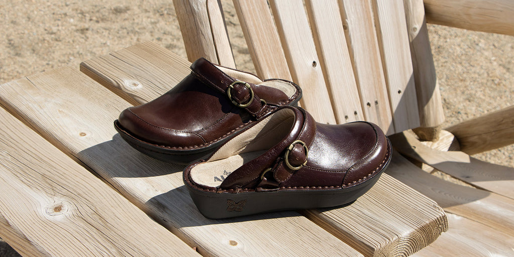 Seville Choco Luster clog with versatile swivel strap, on classic rocker outsole.
