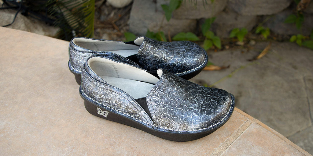 Debra Spherical on a classic rocker outsole with a textured blue leather upper. DEB-7417