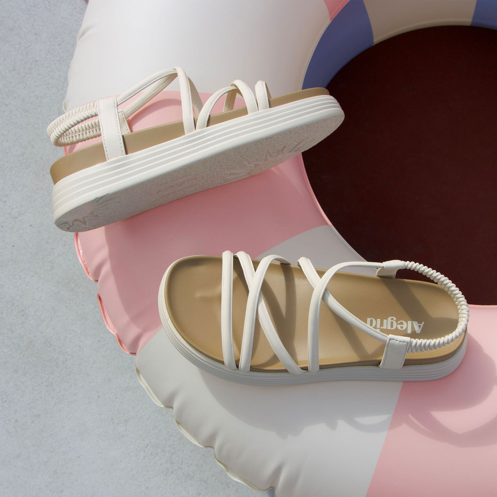 Audie Crème Brulee sandal on an Elevated sport outsole | Cream colored strappy sandal.