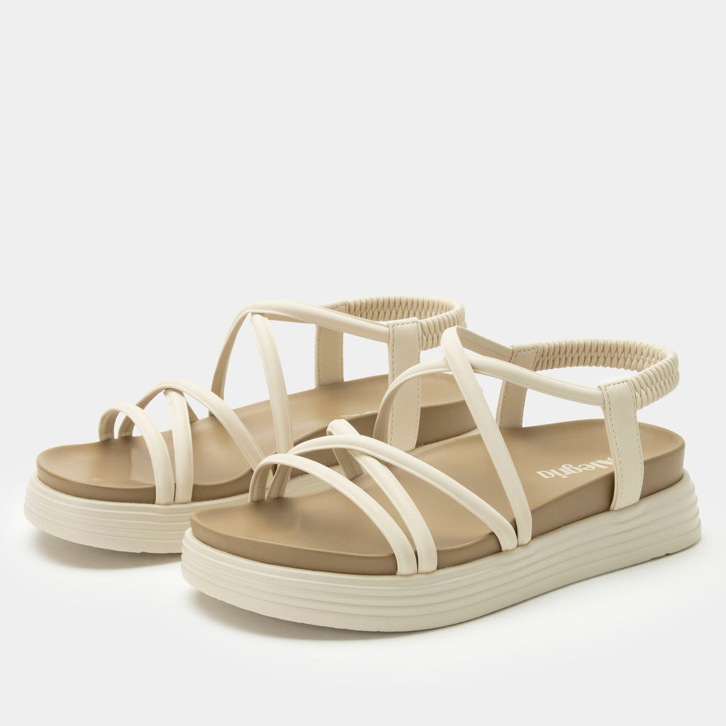 Audie Crème Brulee sandal on an Elevated sport outsole | Cream colored strappy sandal.