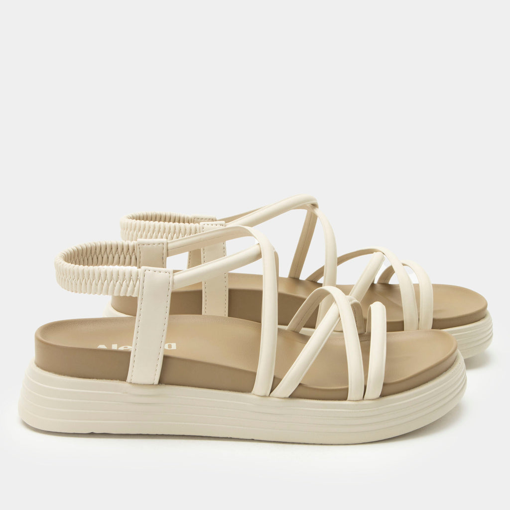 Audie Crème Brulee sandal on an Elevated sport outsole | Cream colored strappy sandal.