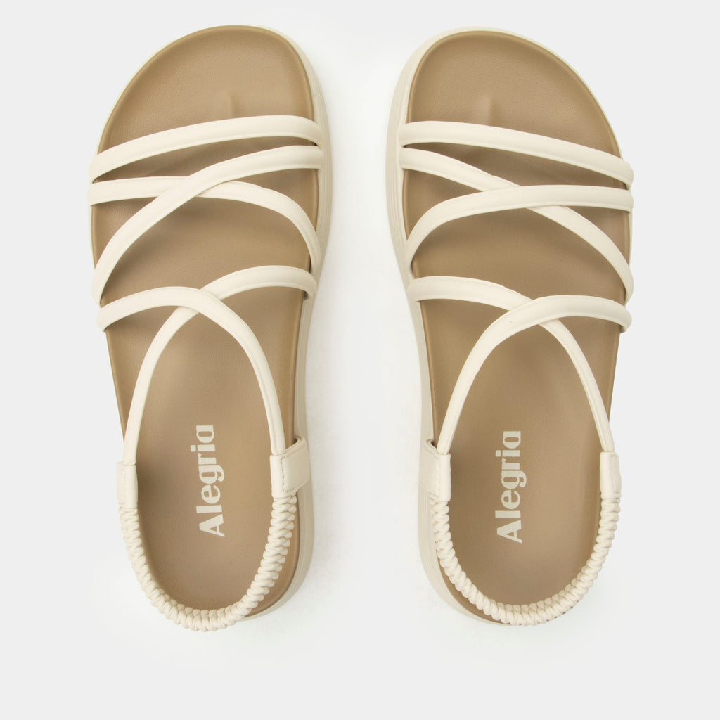 Audie Crème Brulee sandal on an Elevated sport outsole | Cream colored strappy sandal.