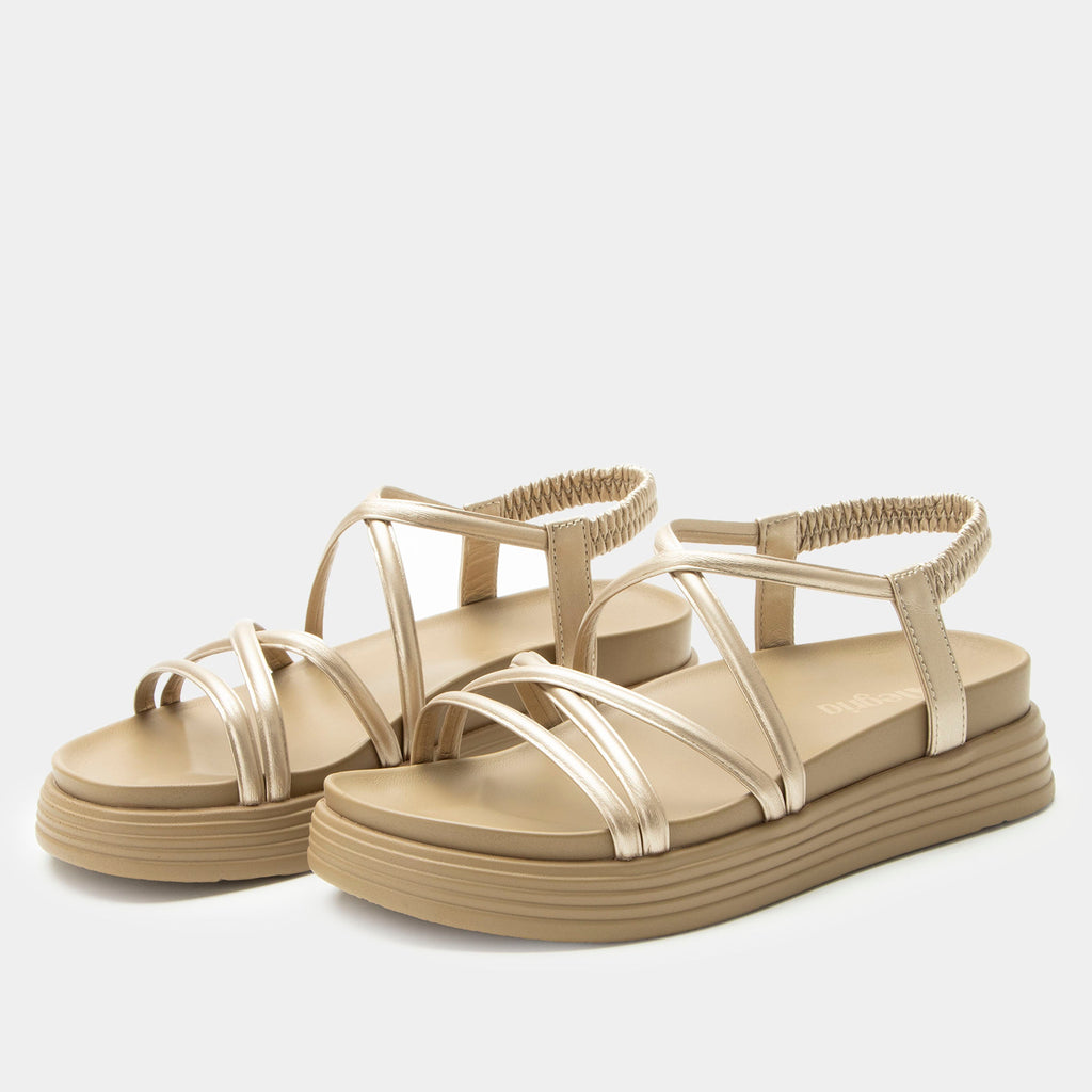 Audie Champagne sandal on an Elevated sport outsole | Gold colored strappy sandal.