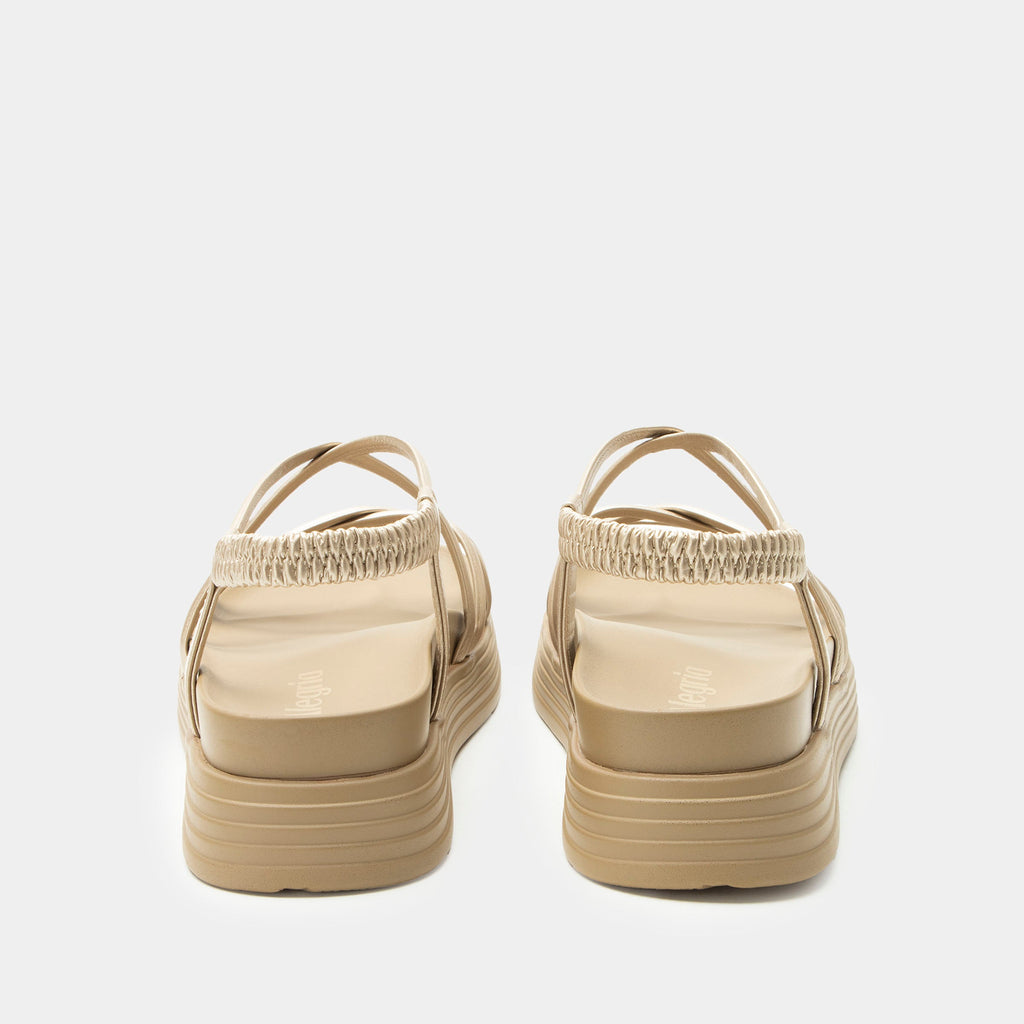 Audie Champagne sandal on an Elevated sport outsole | Gold colored strappy sandal.