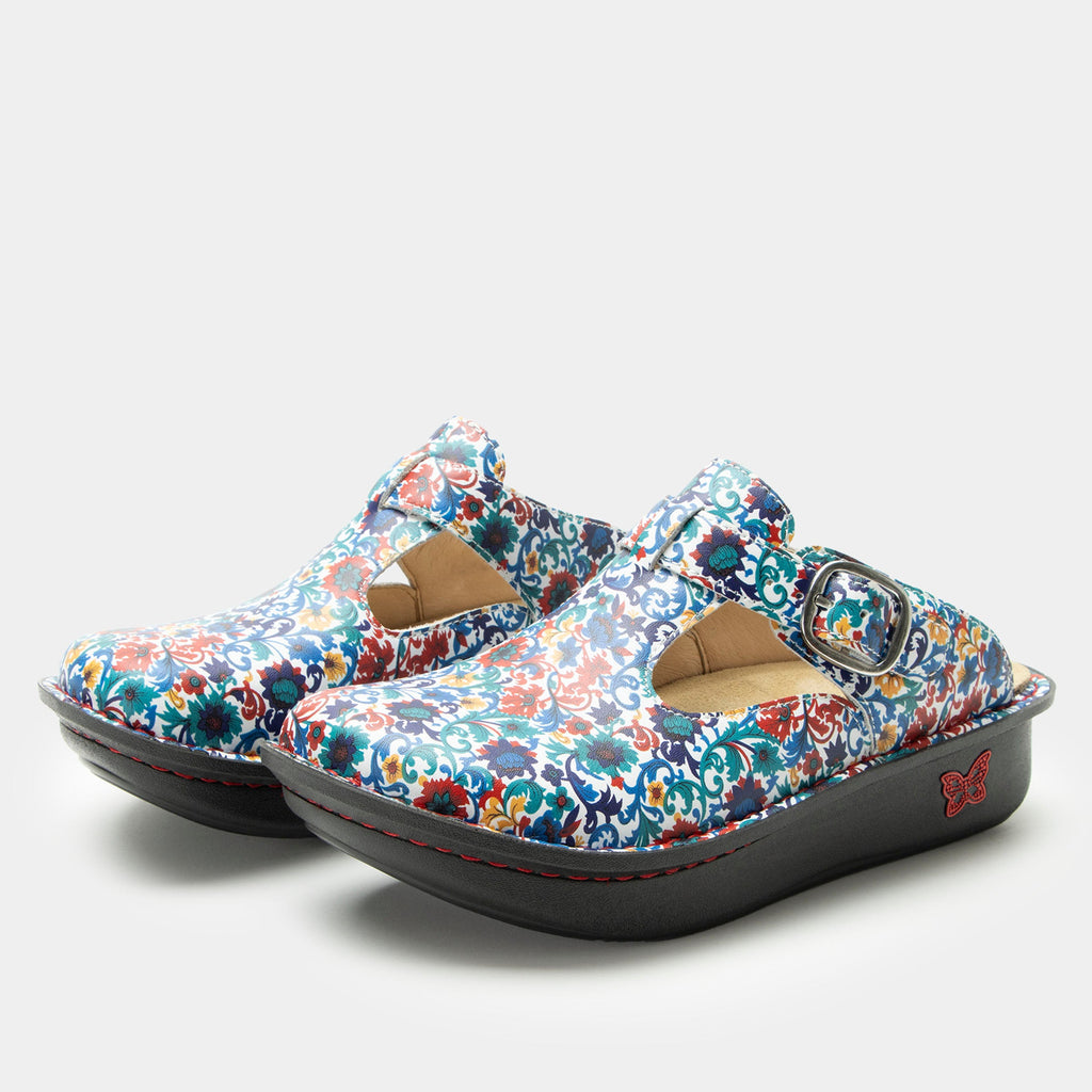 Classic Primary Party open back clog on a classic rocker outsole | Clog with multi color flowers on  a leather upper.