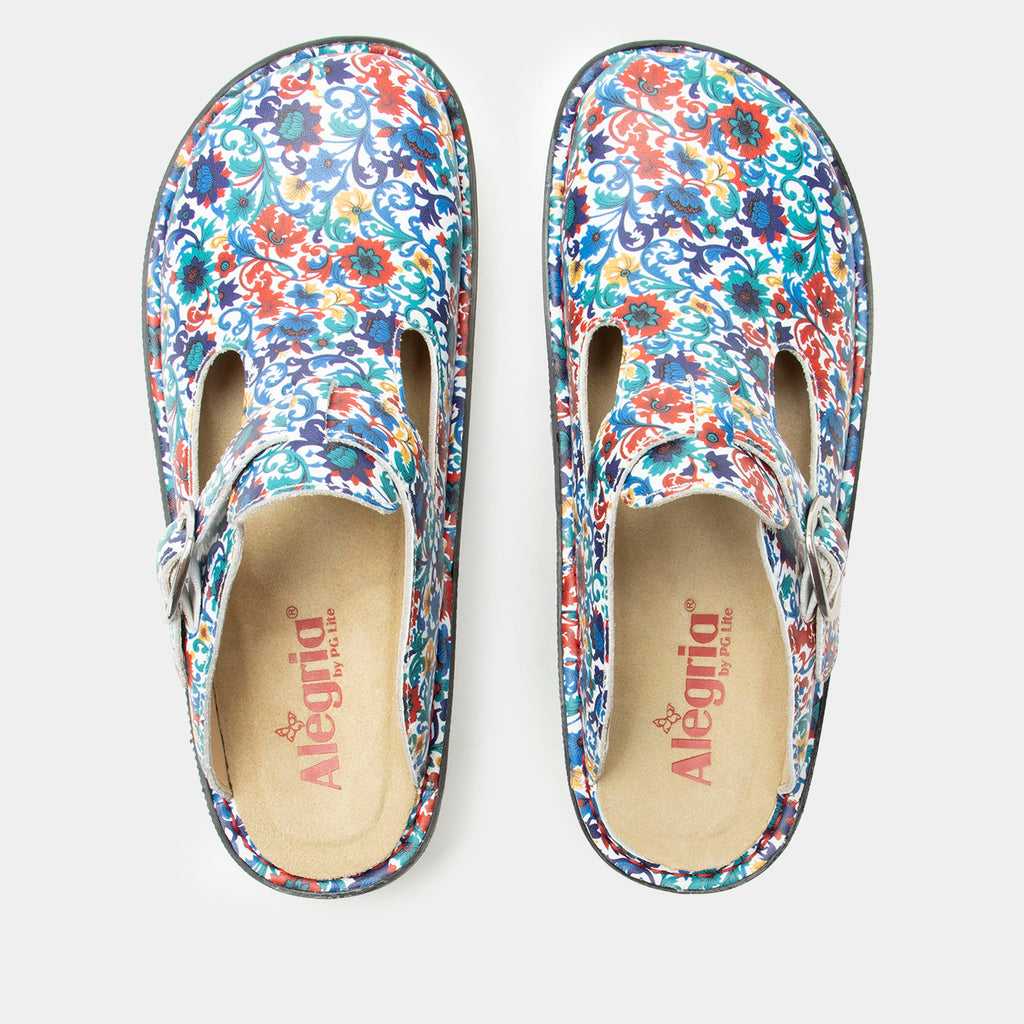 Classic Primary Party open back clog on a classic rocker outsole | Clog with multi color flowers on  a leather upper.