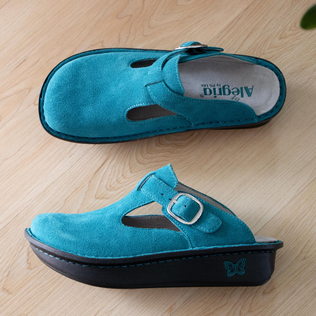 Classic Unteal Now open back clog on a classic rocker outsole |Clog with a Teal nubuck leather upper.