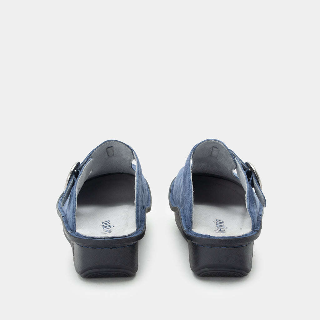 Shimmer Blue  suede slip-on clogs shown from the back, featuring a blue suede upper with a dark sole and heel, and grey suede leather lining. ALG-6559