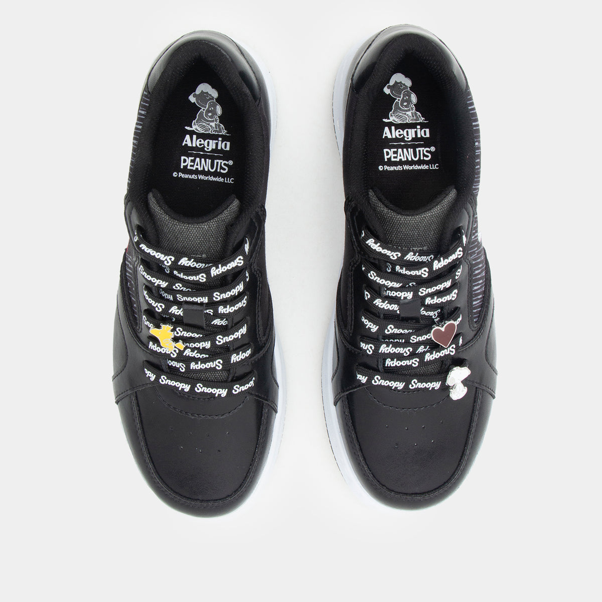 Alyster Happy to Help Top view of a black and white lace-up shoe featuring Peanuts®  characters- showing the laces and lace charms included with this limited edition style.