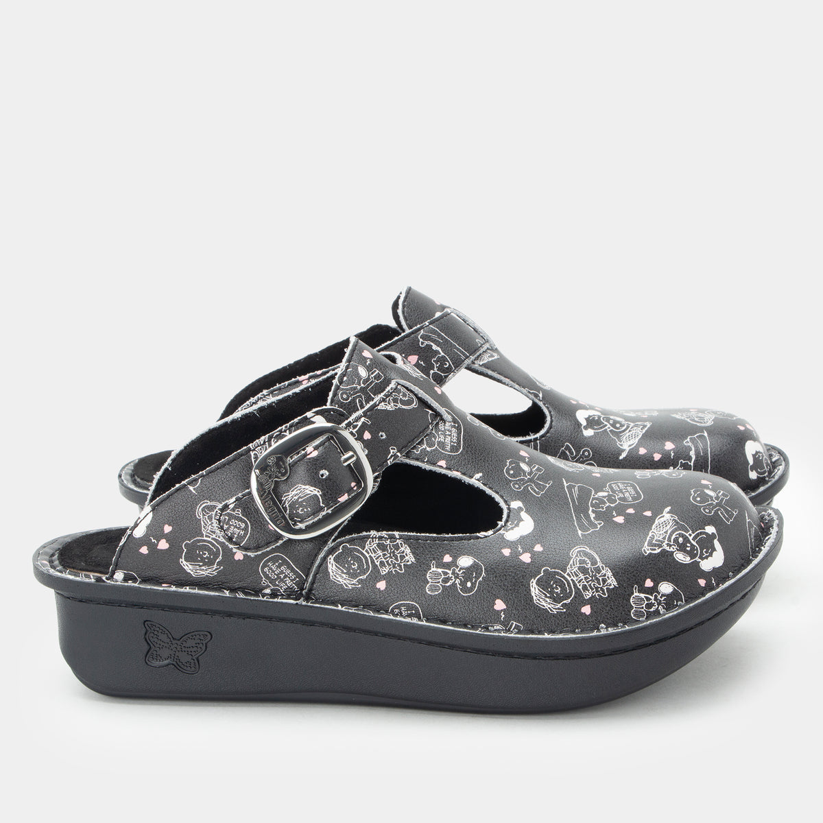 Classic Black Snuggles Side view of Black clog featuring Peanuts® character doodle on a Classic rocker outsole- showing silver buckle hardware.