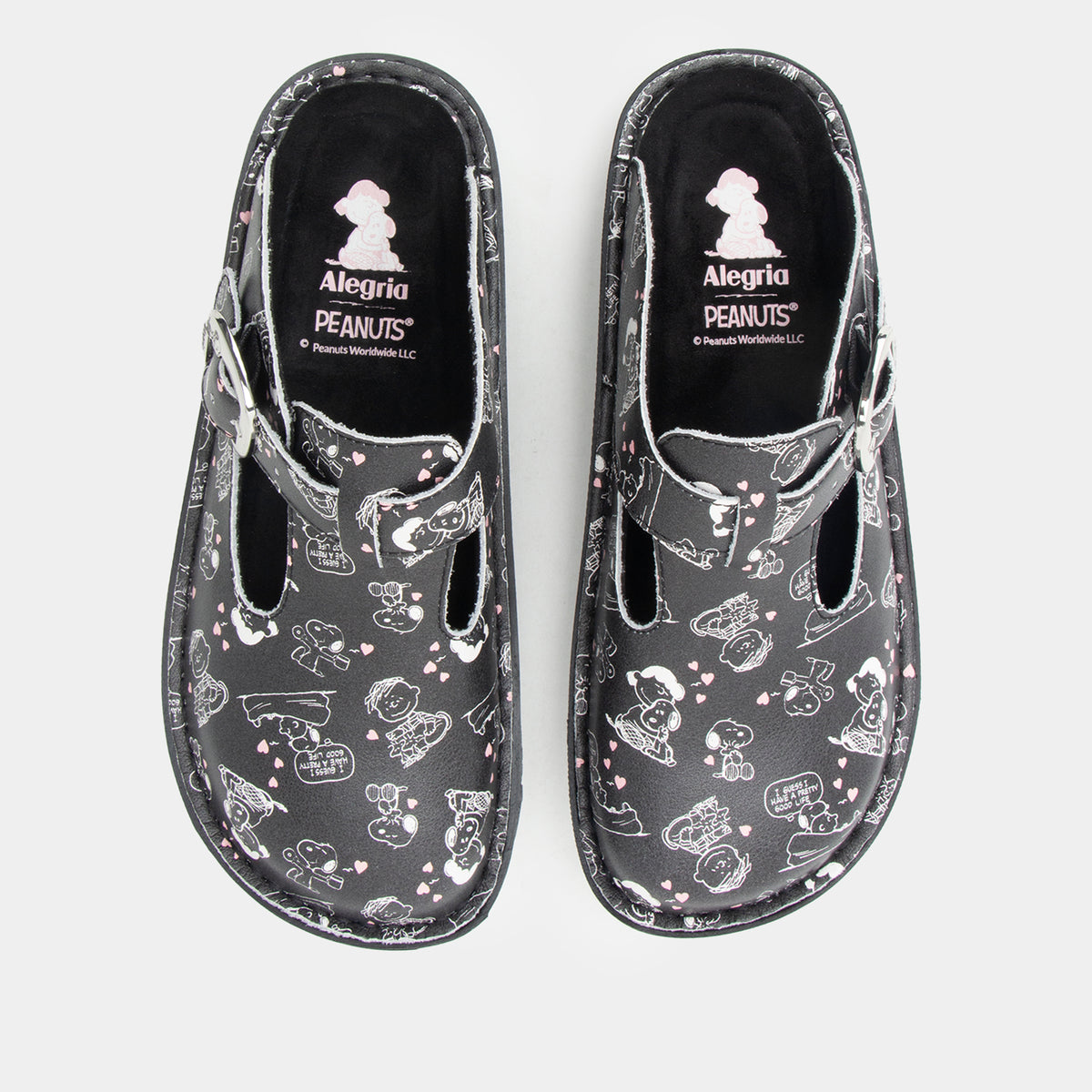 Classic Black Snuggles Top view of Black clog featuring Peanuts® character doodle on a Classic rocker outsole- showing black and white snuggle print with small pink hearts.