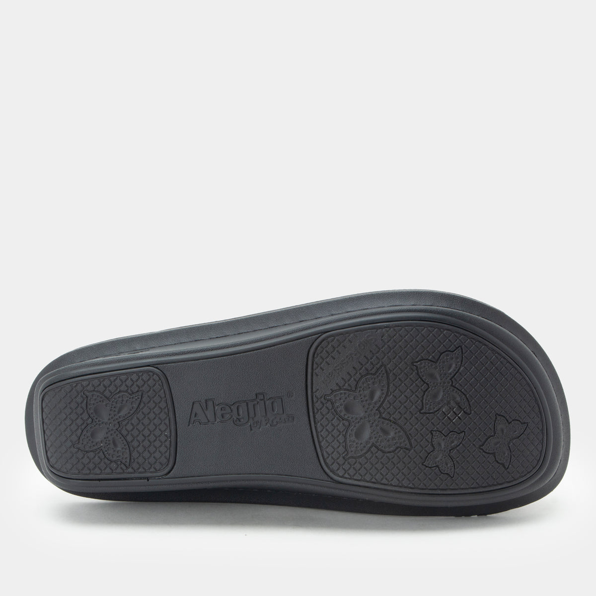 Classic Black Snuggles Bottom view showing the textured outsole.