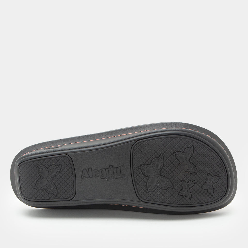 Classic Rose Snuggles Bottom view showing the textured outsole.