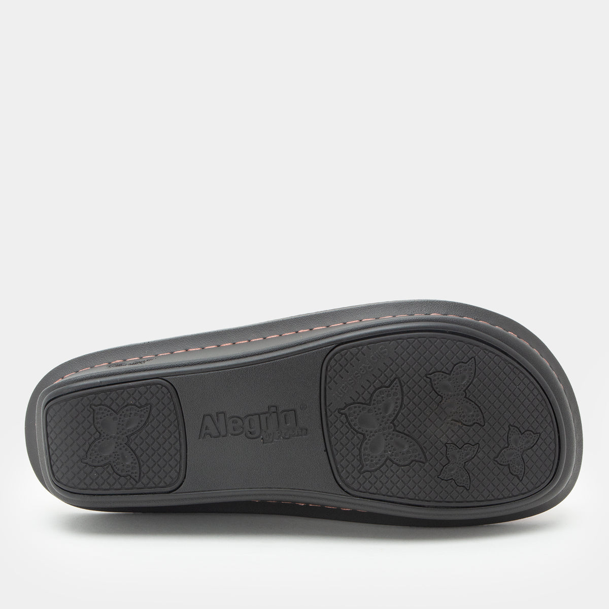 Classic Rose Snuggles Bottom view showing the textured outsole.