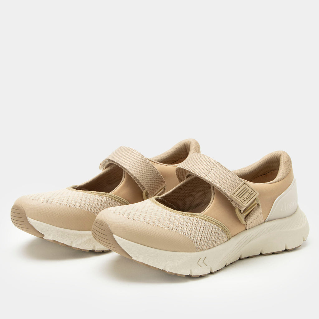 Atlis Dunes shoe on a lightweight EVA Rebounce outsole. | Tan mary jane style tennis shoe with adjustable strap.