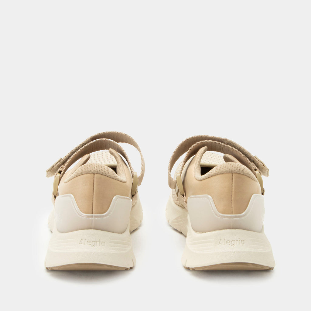 Atlis Dunes shoe on a lightweight EVA Rebounce outsole. | Tan mary jane style tennis shoe with adjustable strap.