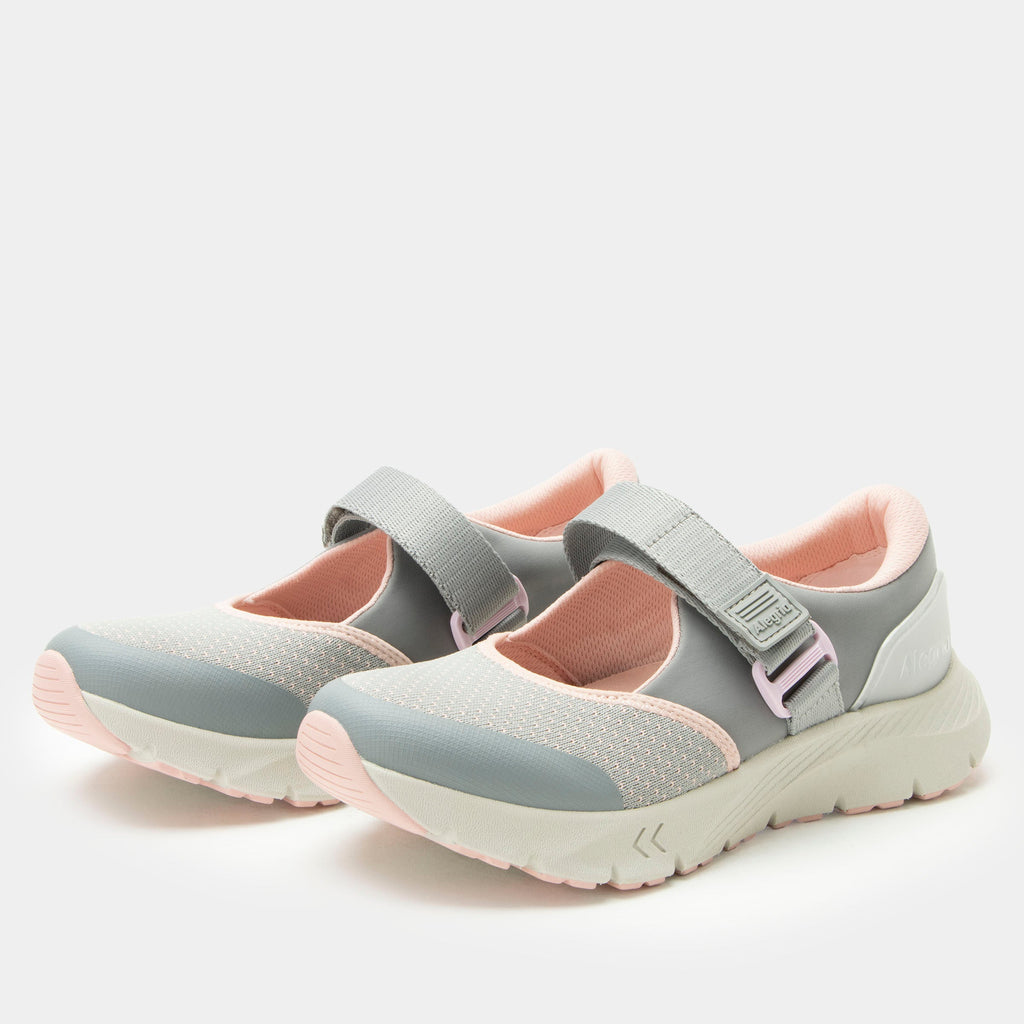 Atlis Frosting shoe on a lightweight EVA Rebounce outsole. | Grey mary jane style tennis shoe with adjustable strap.