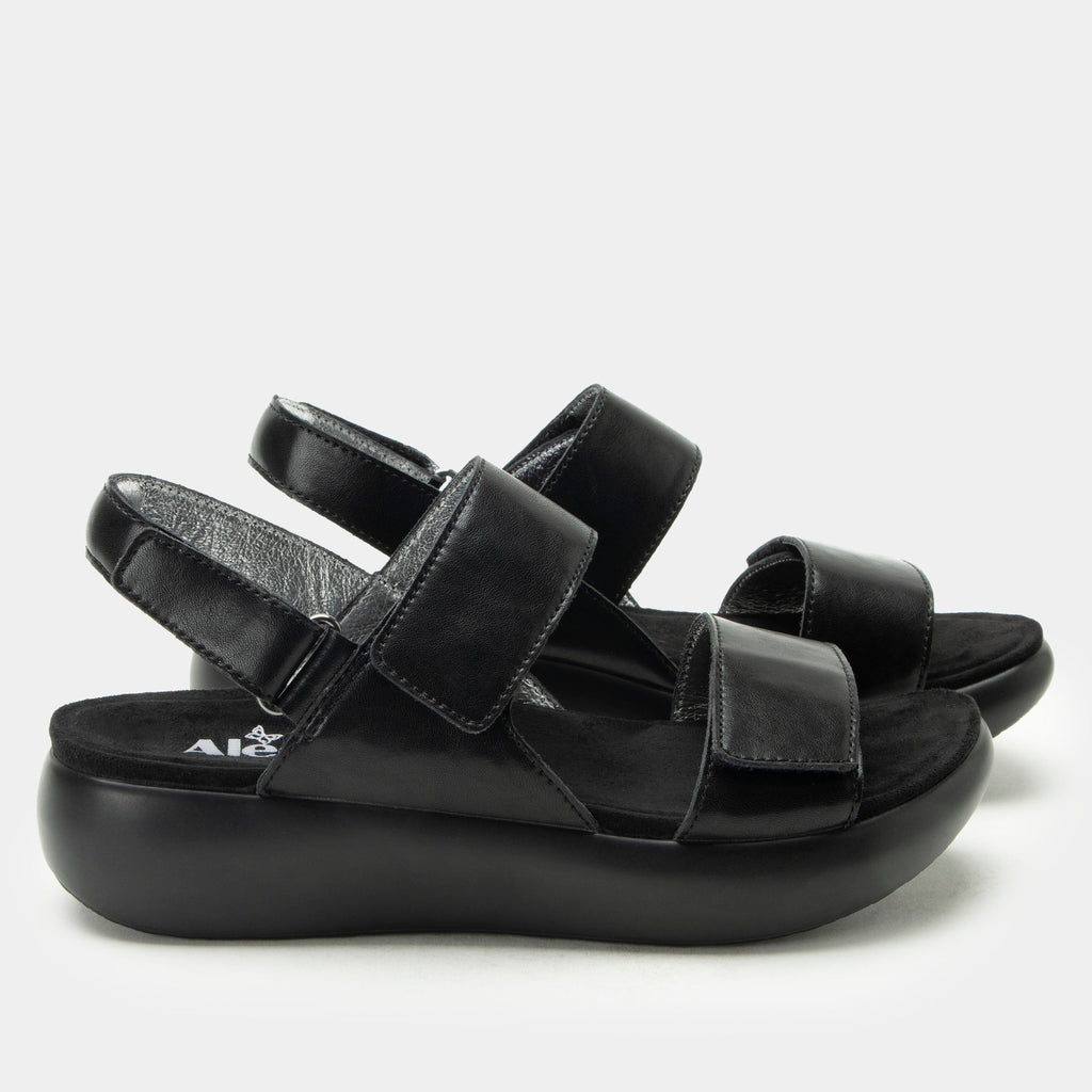 Bailee Ink sandal| Black leather sandal on a non-flexing rocker outsole.