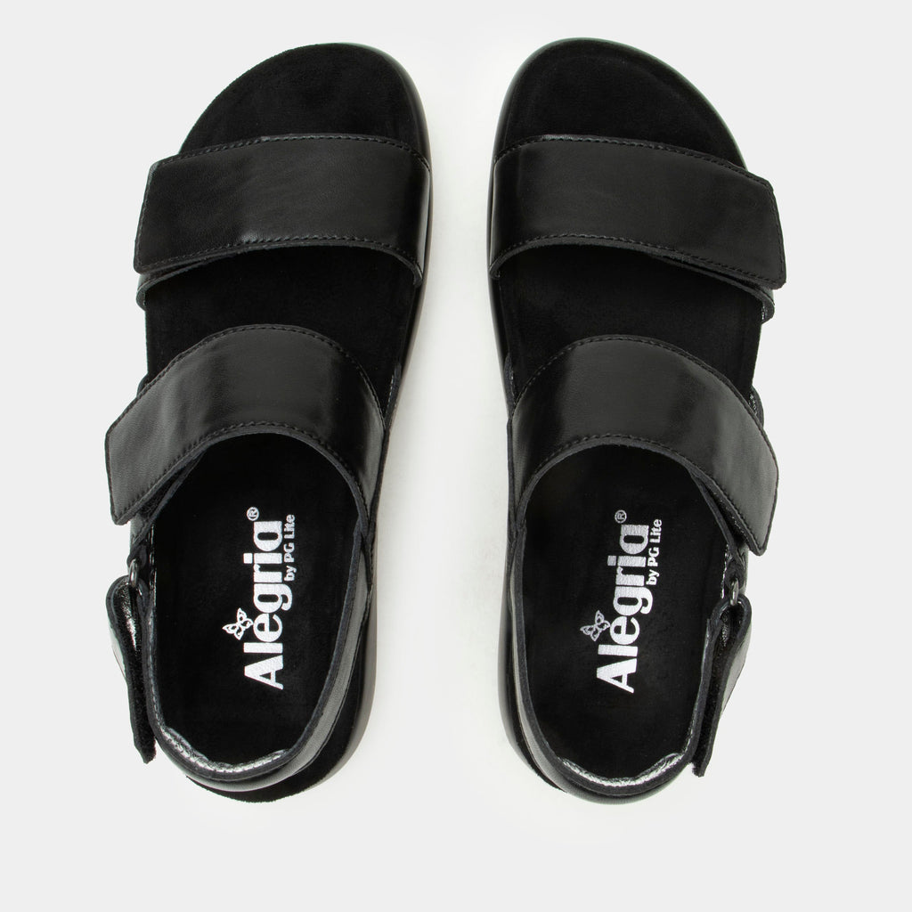 Bailee Ink sandal| Black leather sandal on a non-flexing rocker outsole.