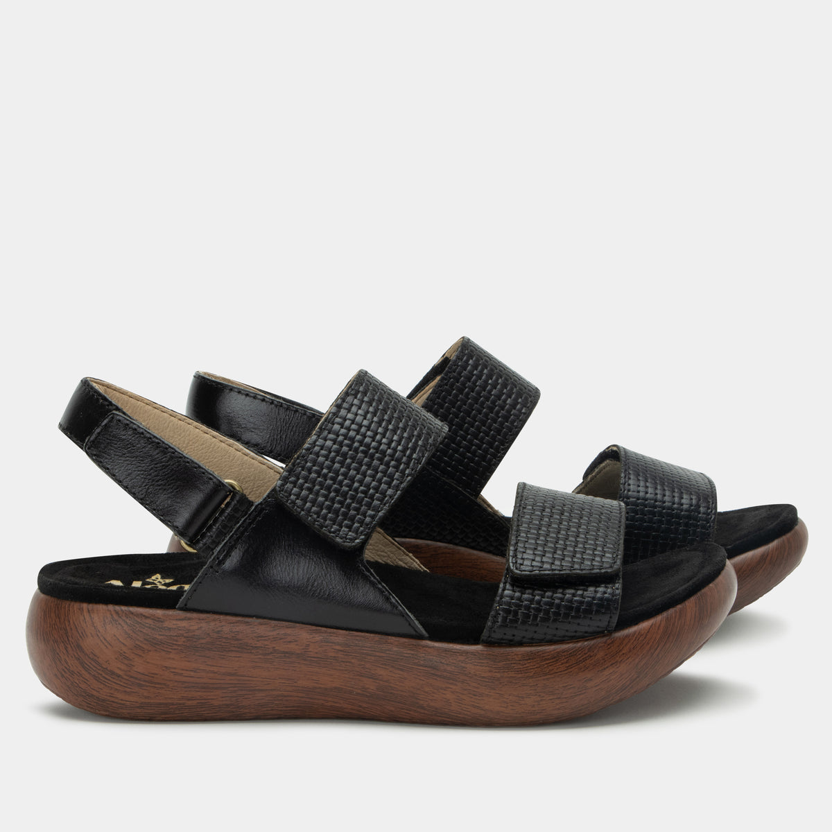 Bailee Woven Noir ankle strap adjustable sandal with non-flexing sleek rocker bottom with built in arch support.