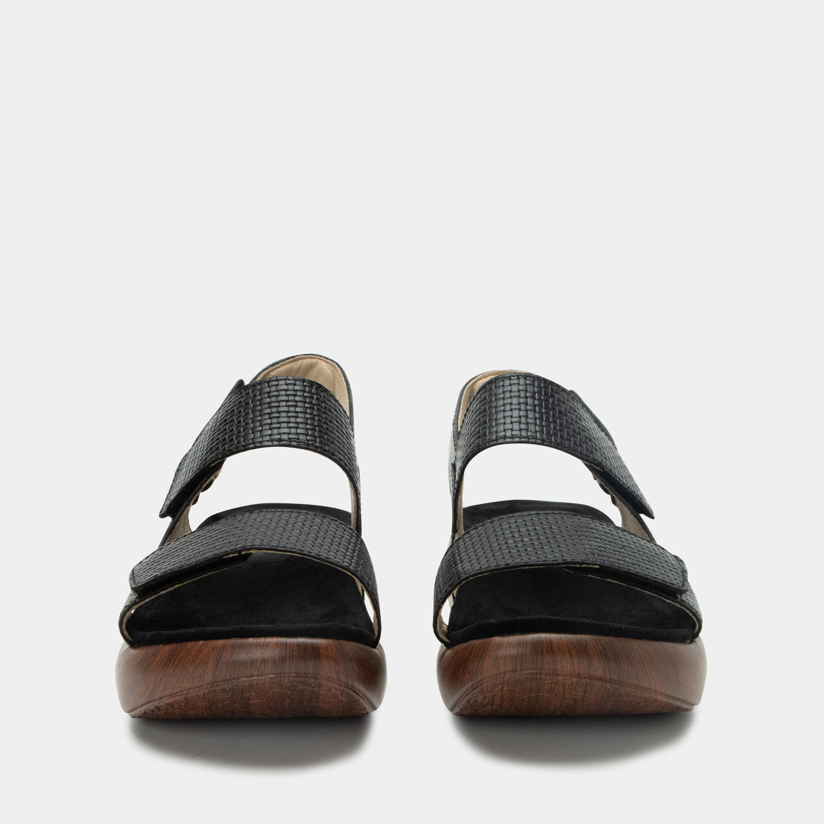 Bailee Woven Noir ankle strap adjustable sandal with non-flexing sleek rocker bottom with built in arch support.