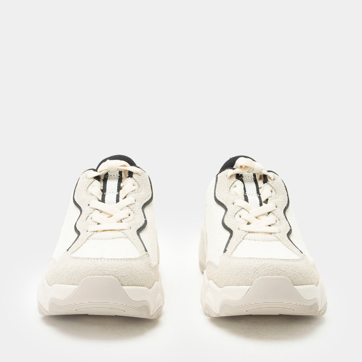 Boom Joy Unbleached Lined shoe on a lightweight EVA Boom Joy outsole. | Tan lace up shoe with black lining.