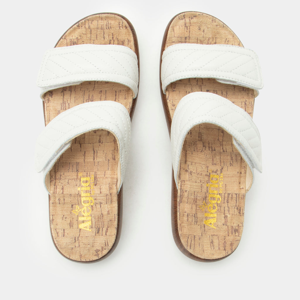 Brayah White adjustable sandal with non-flexing sleek rocker bottom with built in arch support 