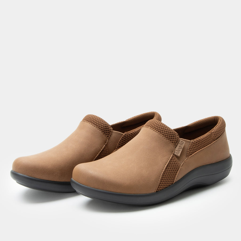 Duette Washed Cognac sport rocker shoe on a lightweight responsive polyurethane outsole | A brown vegan leather slip on shoe with textile lining.