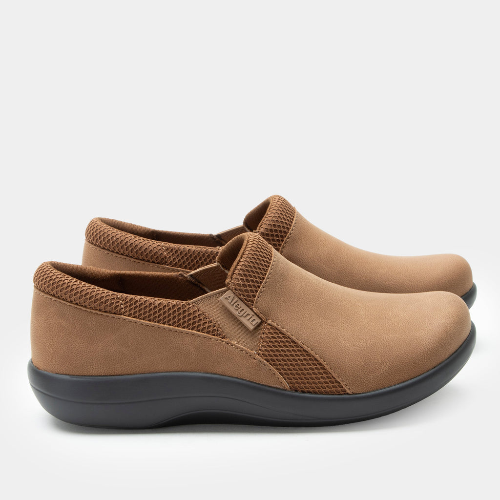 Duette Washed Cognac sport rocker shoe on a lightweight responsive polyurethane outsole | A brown vegan leather slip on shoe with textile lining.