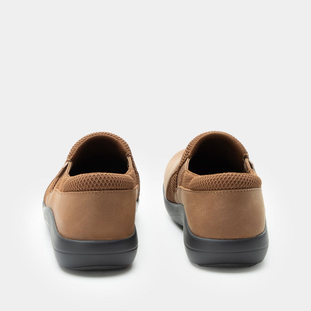 Duette Washed Cognac sport rocker shoe on a lightweight responsive polyurethane outsole | A brown vegan leather slip on shoe with textile lining.