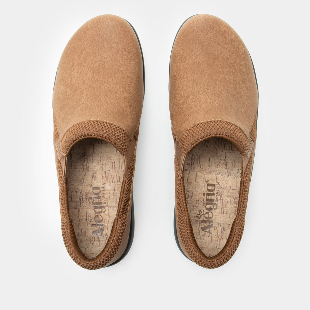 Duette Washed Cognac sport rocker shoe on a lightweight responsive polyurethane outsole | A brown vegan leather slip on shoe with textile lining.