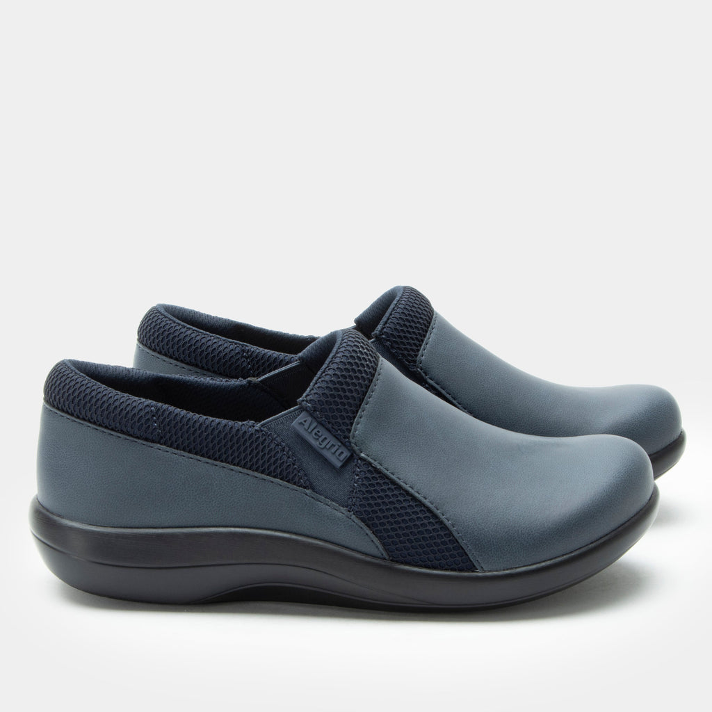 Duette Washed Navy sport rocker shoe on a lightweight responsive polyurethane outsole | A Navy vegan leather slip on shoe with textile lining.