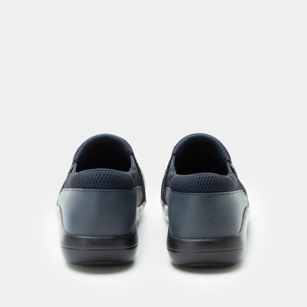 Duette Washed Navy sport rocker shoe on a lightweight responsive polyurethane outsole | A Navy vegan leather slip on shoe with textile lining.