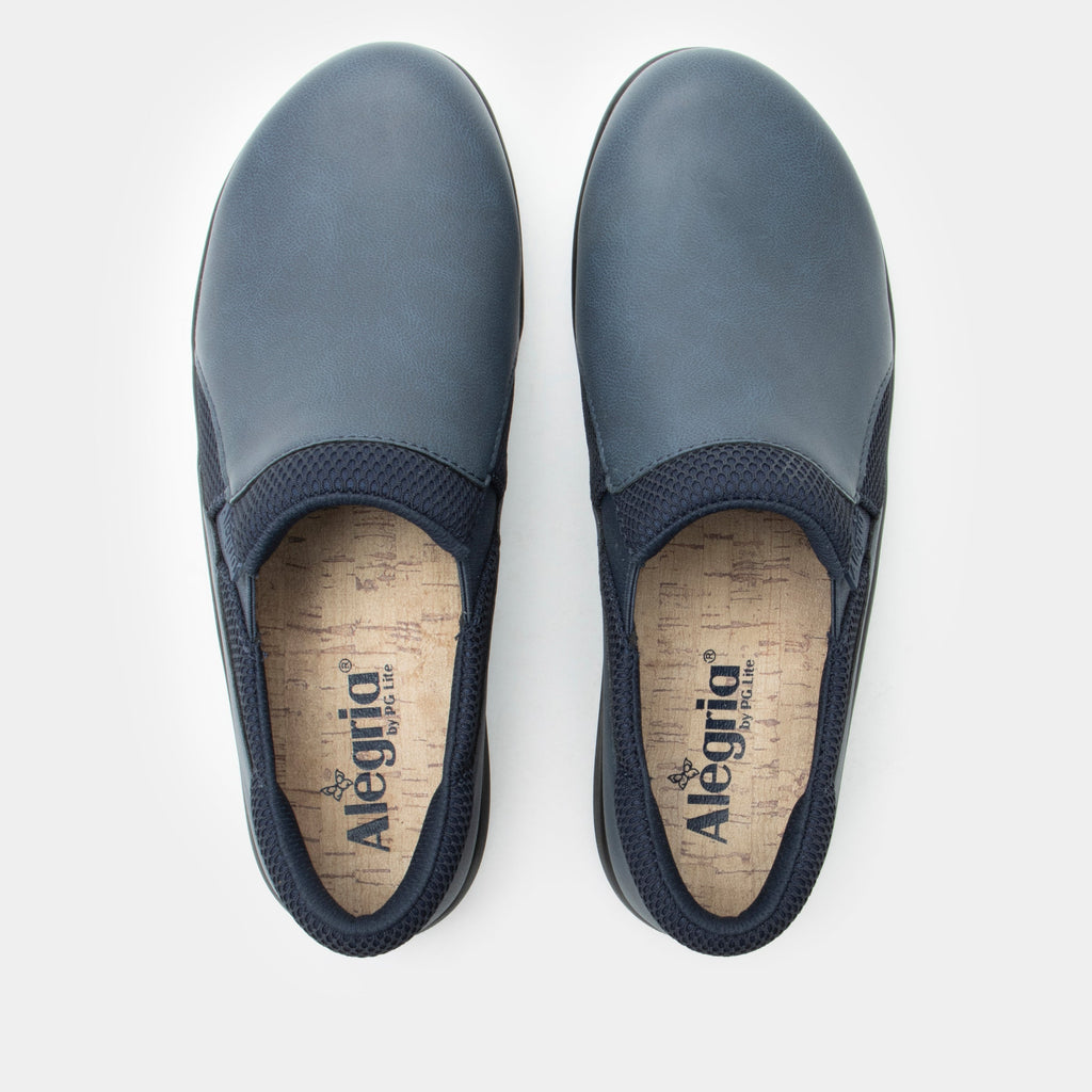 Duette Washed Navy sport rocker shoe on a lightweight responsive polyurethane outsole | A Navy vegan leather slip on shoe with textile lining.