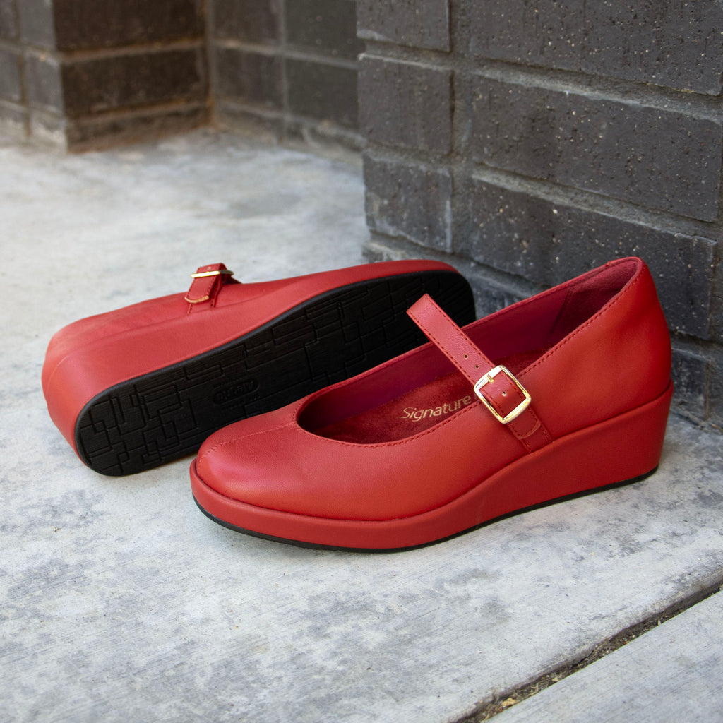 Haylo Ruby shoe on a Trimform wedge outsole | Red leather with a hook and loop strap.