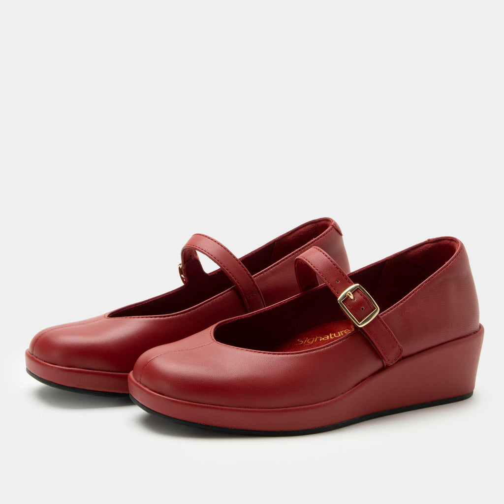 Haylo Ruby shoe on a Trimform wedge outsole | Red leather with a hook and loop strap.