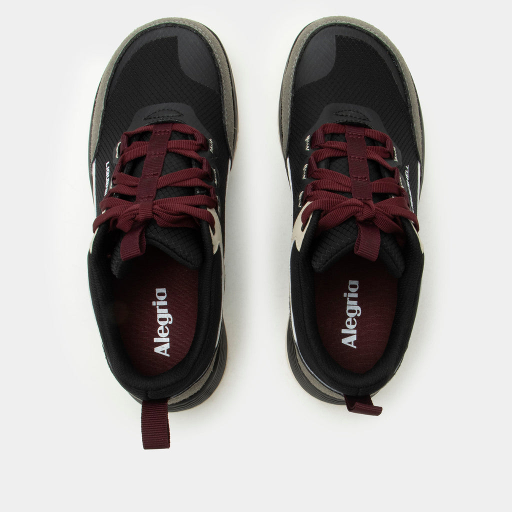 Motov8 Raven shoe on a Ergo Flo outsole. | Black multi colored lace up shoe with burgundy laces on water repelling Liquid Shell™ uppers.