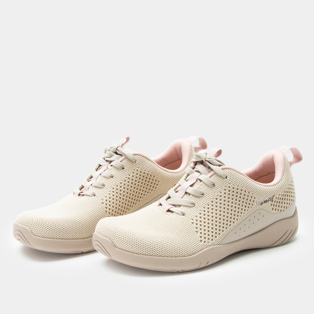 N8ture Blush shoe on a Ergo Flo Lite outsole | Tan lace up shoe with knit upper and a pink lining.