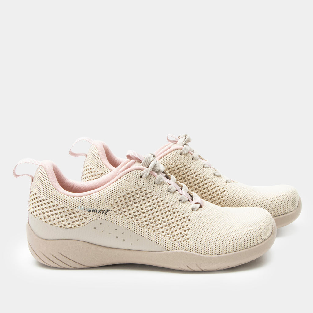 N8ture Blush shoe on a Ergo Flo Lite outsole | Tan lace up shoe with knit upper and a pink lining.