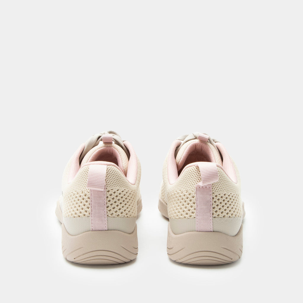 N8ture Blush shoe on a Ergo Flo Lite outsole | Tan lace up shoe with knit upper and a pink lining.