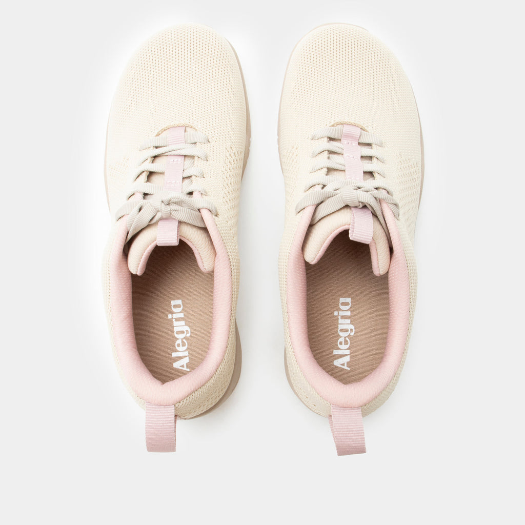 N8ture Blush shoe on a Ergo Flo Lite outsole | Tan lace up shoe with knit upper and a pink lining.