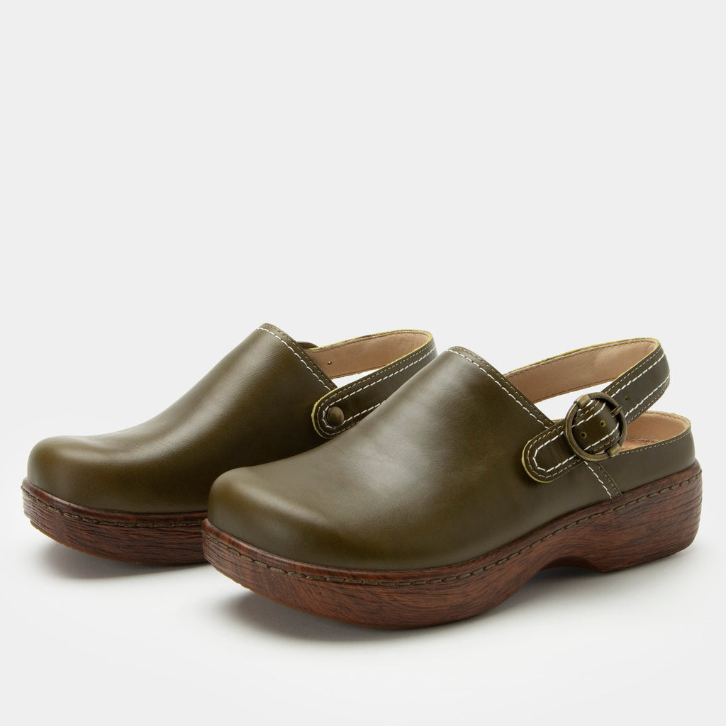 Olie Oliva slip on style shoe on a Wood look rocker outsole |Dark green shoe with leather upper.