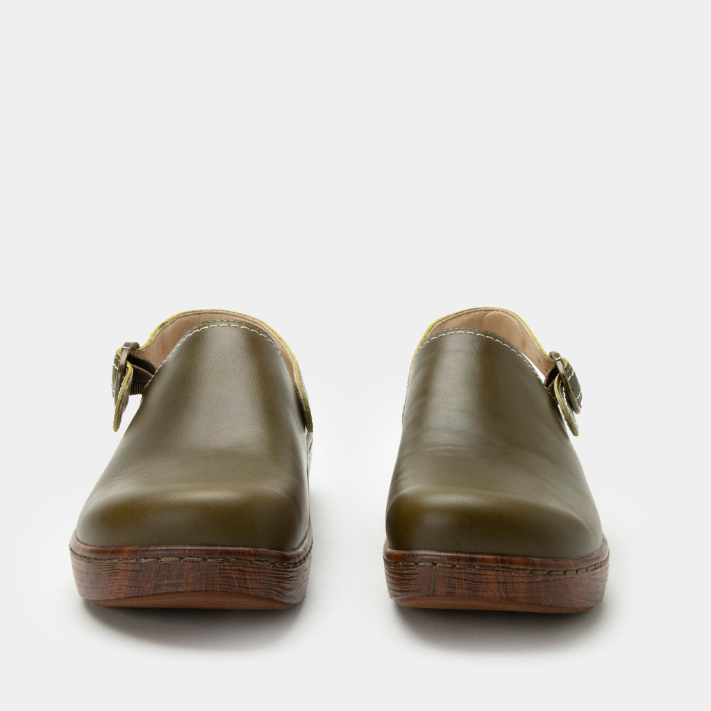 Olie Oliva slip on style shoe on a Wood look rocker outsole |Dark green shoe with leather upper.