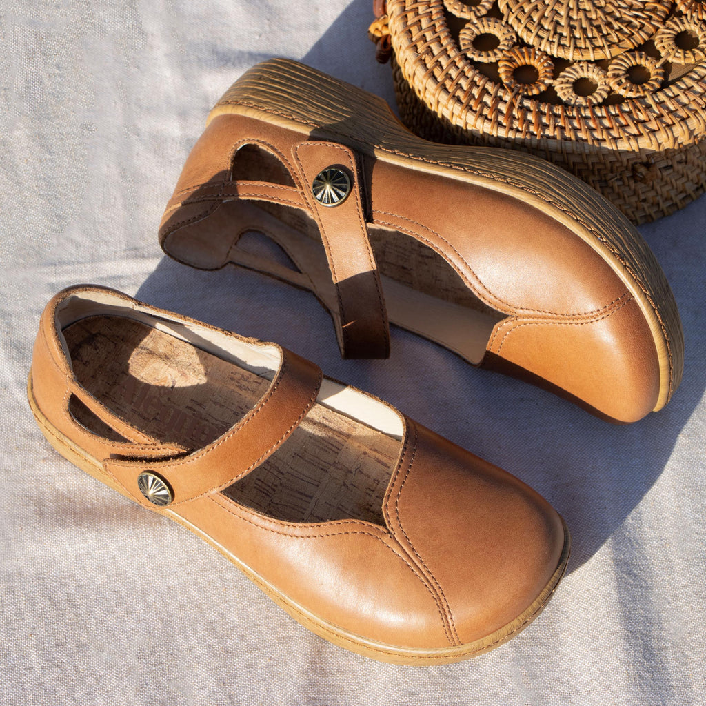 Onika Rancho Shoe on a Wood look rocker outsole |Mary Jane style with a tan leather upper.