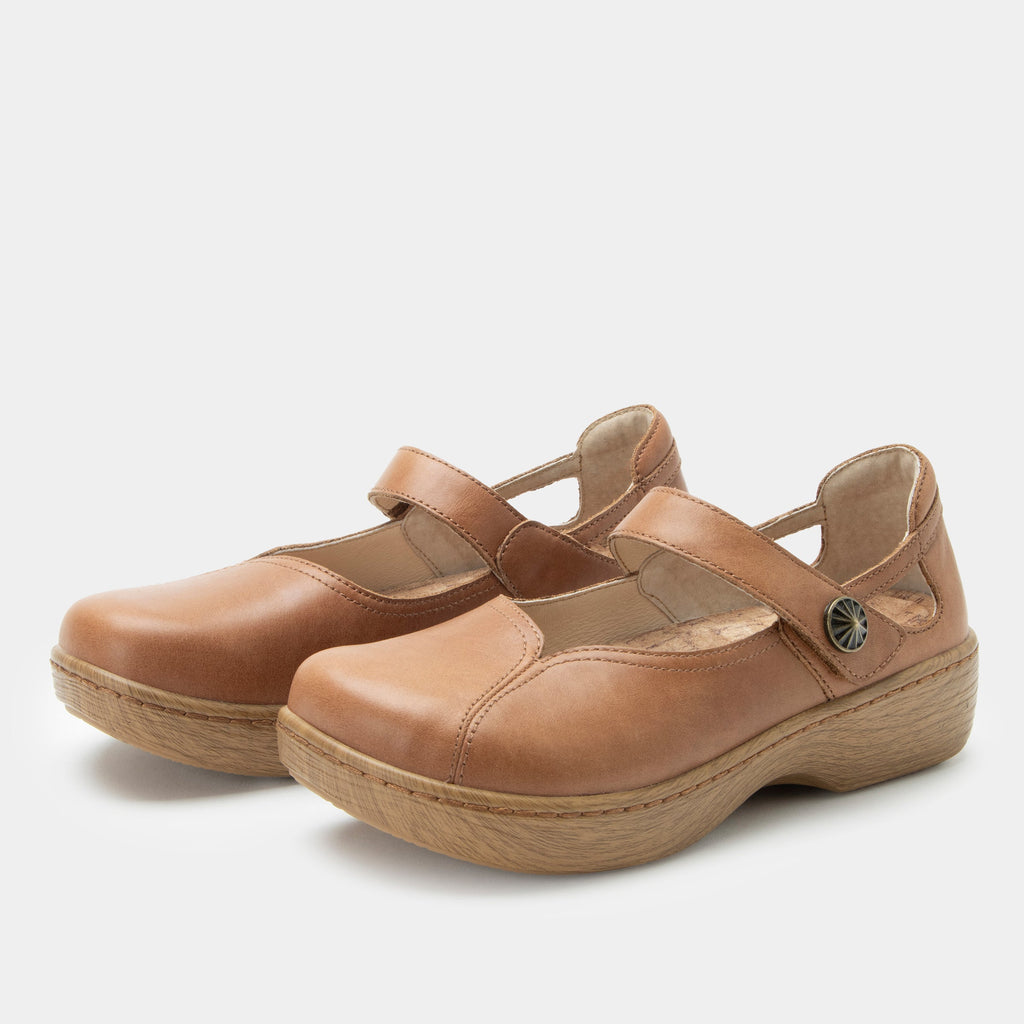 Onika Rancho Shoe on a Wood look rocker outsole |Mary Jane style with a tan leather upper.