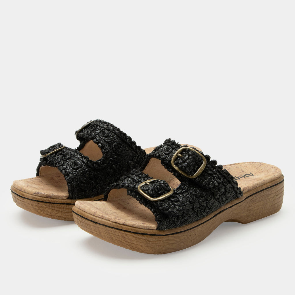 Oona Black sandal on a Wood look rocker outsole | Slide on sandal with two straps and a black braided leather upper.