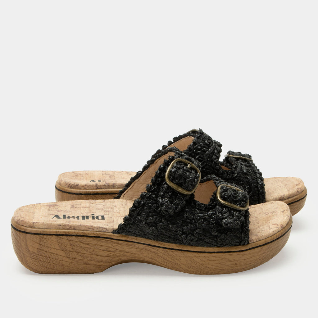 Oona Black sandal on a Wood look rocker outsole | Slide on sandal with two straps and a black braided leather upper.